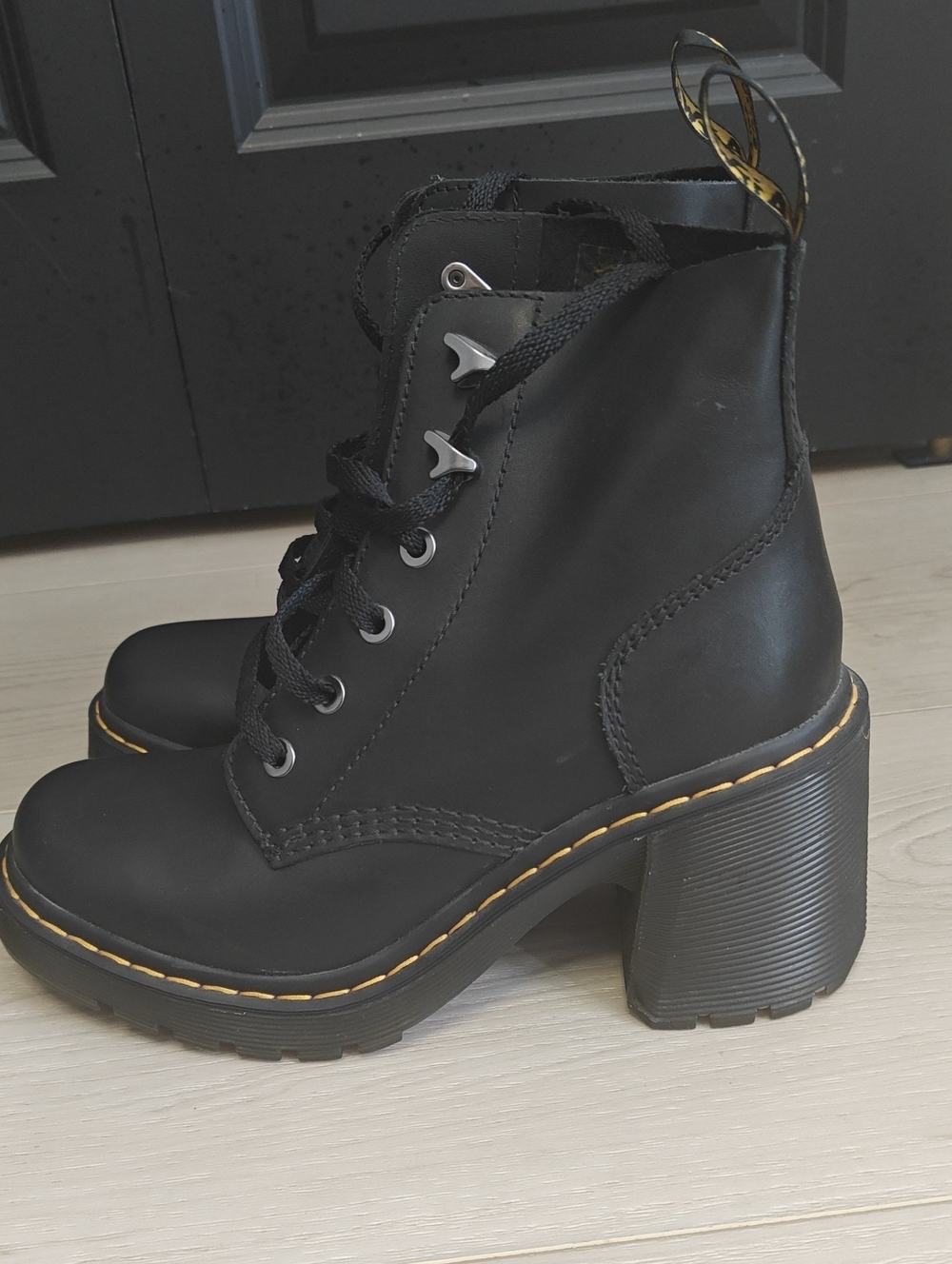 Dr. Martens Women's Black Lace-Up Chunky Heel Boots with Yellow Stitching